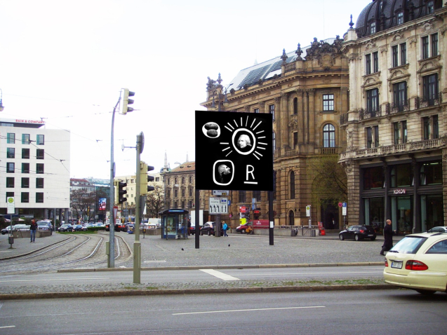 Frontal view of the billboard at Lenbachplatz, taken towards the city centre. A taxi is passing in the foreground. The billboard in the centre of the square features a work by the artist Martin Fengel. It shows four objects on a black background. A white underlined 'R' in capital letters. A white circle with a grey image of two potatoes. A white circle with rays emanating from the side, in the centre of which is a black and white portrait of Count Rumford. A second circle with a black and white portrait of a man in profile.